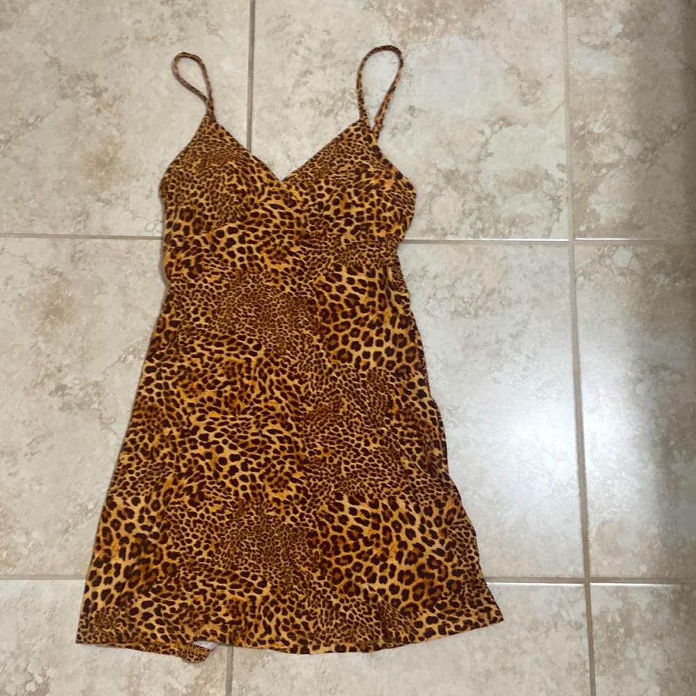 Animal print dress with adjustable straps.